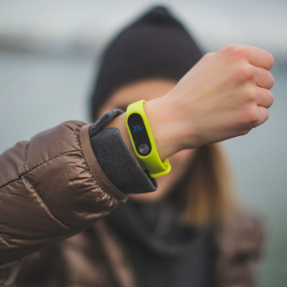 Person wearing a green Xiaomi band