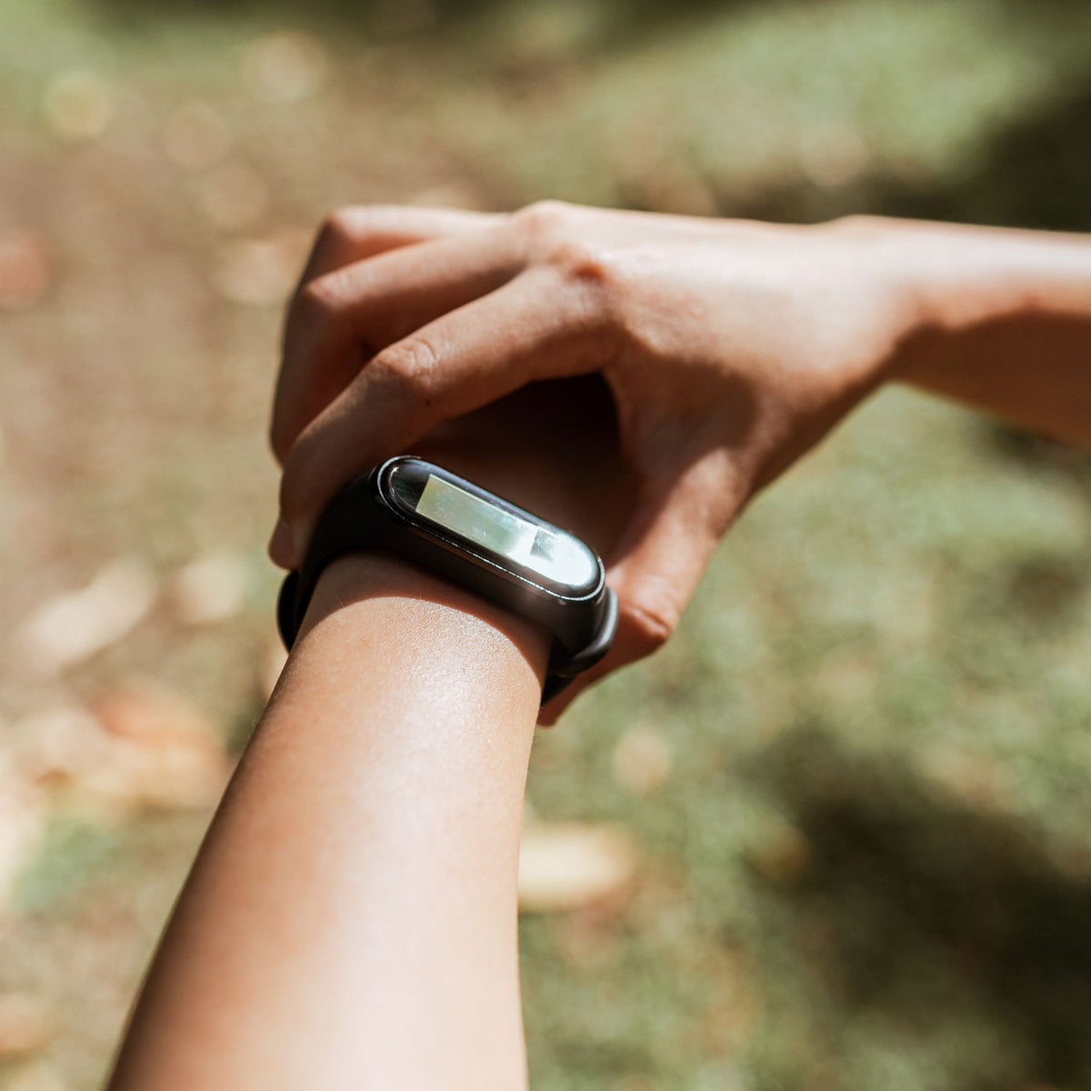 Fitness band on wrist outdoors